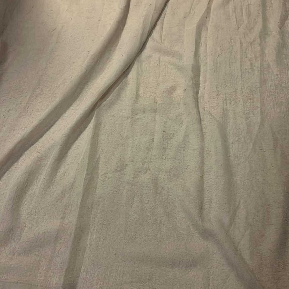 Sheer beige curtain
